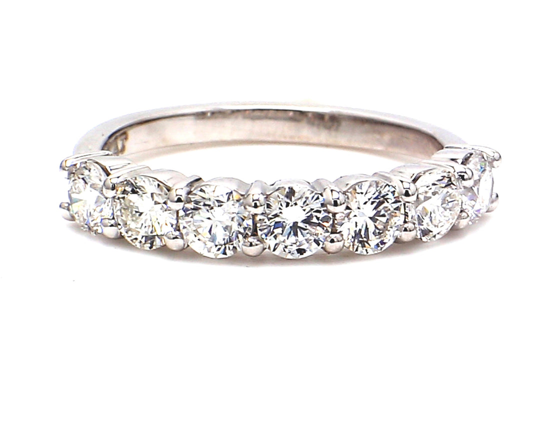 7-stone band in platinum with prong set round diamonds.  D1.00ct.t.w.  Size 5
