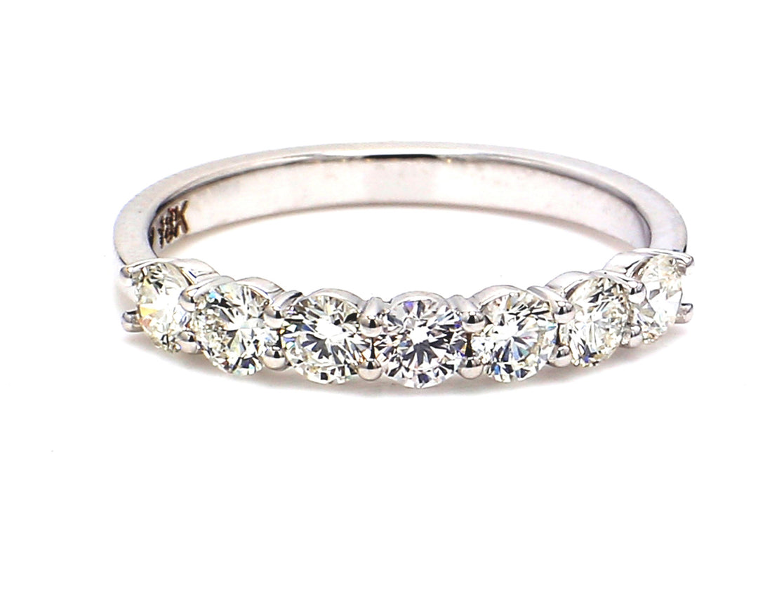 7-stone band in 18K WG with prong set round diamonds.  D0.84ct.t.w.  Size 7