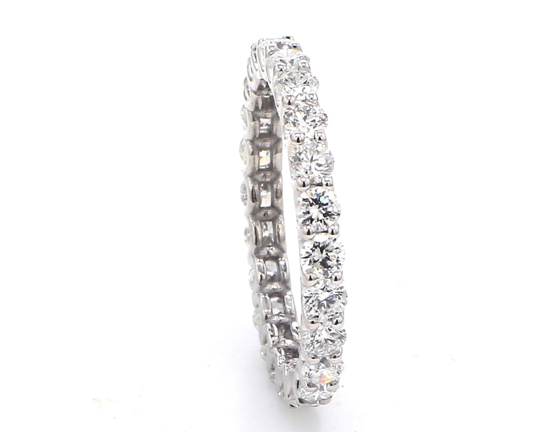 Eternity band with U-prong set (24) round diamonds.  D1.53ct.t.w.  Size 6