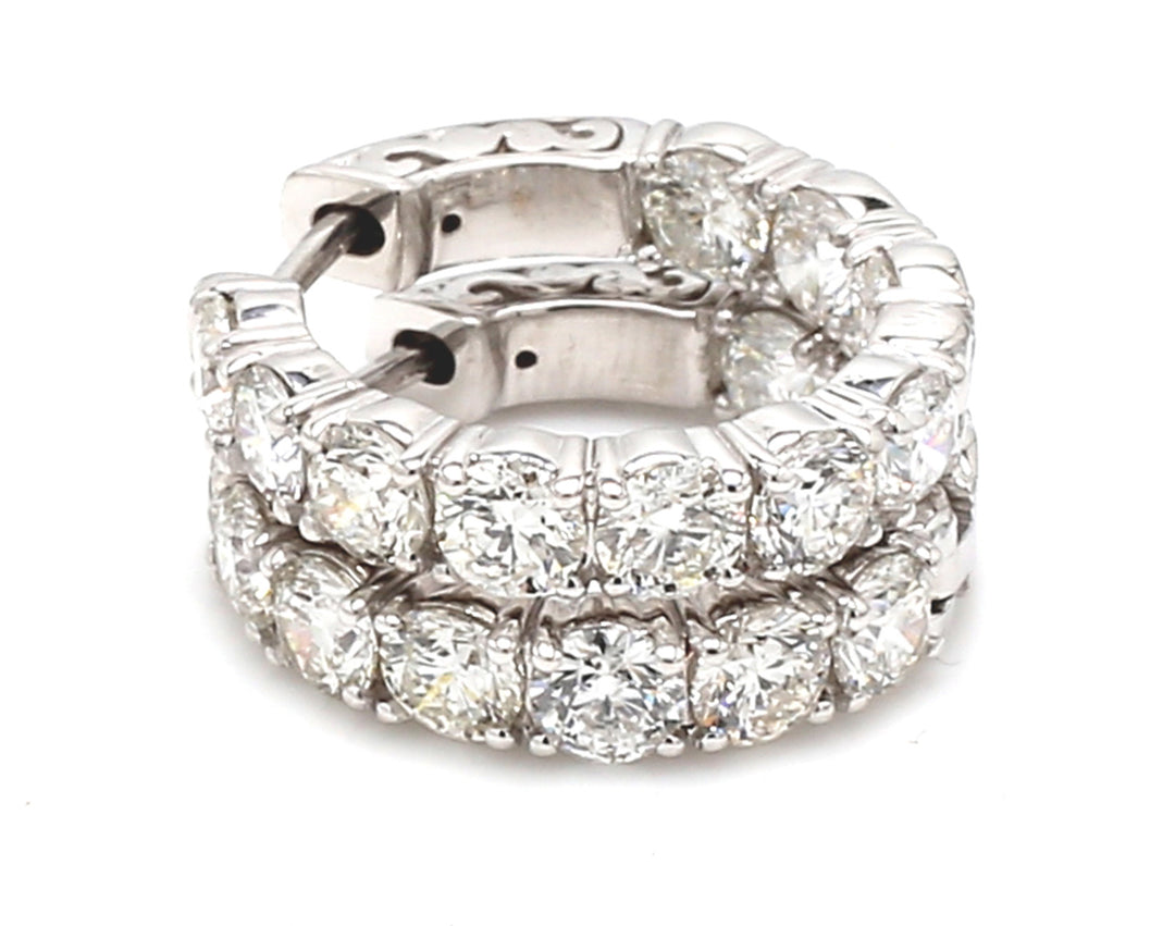 0.75"" Inside out hoop earrings with basket prong set (20) round diamonds.  D4.24ct.t.w.