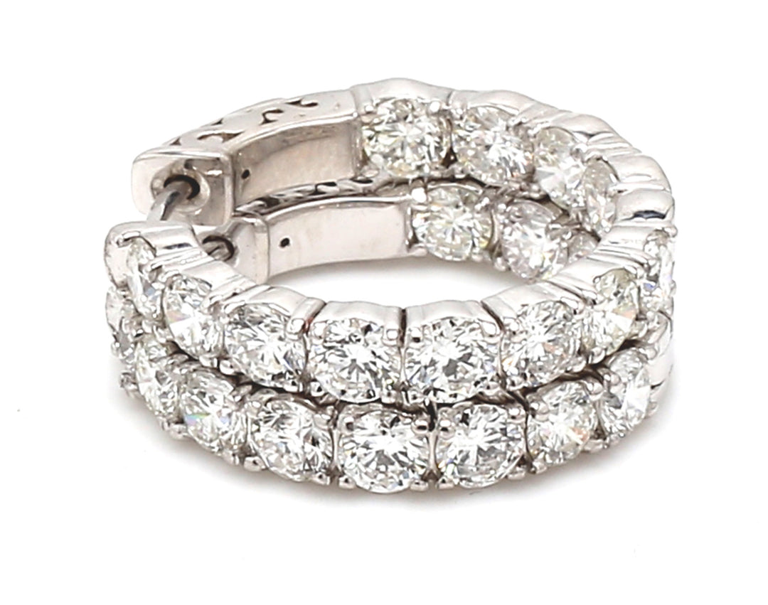 0.75"" Inside out hoop earrings with basket prong set (24) round diamonds.  D3.76ct.t.w.