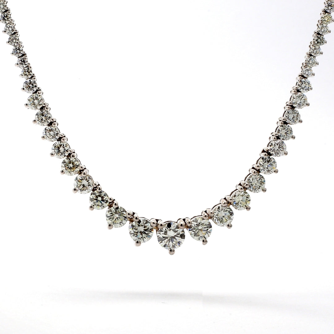18"" Graduating tennis necklace in 18K WG with 3-prong set F-G/SI1 (139) round diamonds.  D21.34ct.t.w.