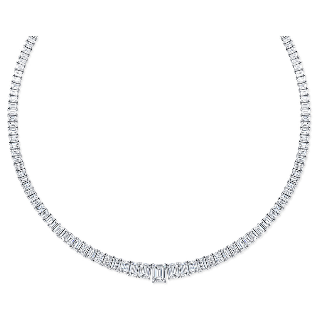18"" Graduated tennis necklace in platinum with 4-prong basket set emerald cuts and GIA certified I/VS2 emerald cut diamond center stone.  D40.82ct.t.w.