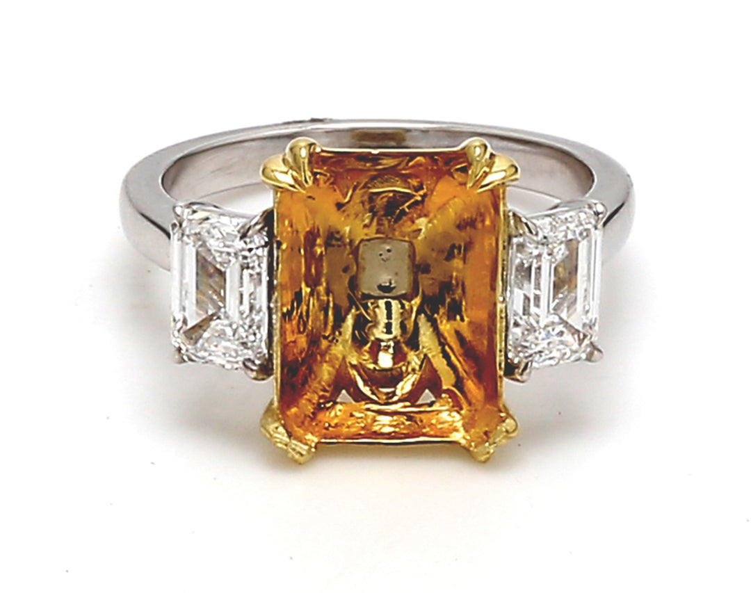 3-stone semi-mount in platinum with GIA certified D/VS2 emerald cut diamond sides.  D1.42ct.t.w.  Size 6.5