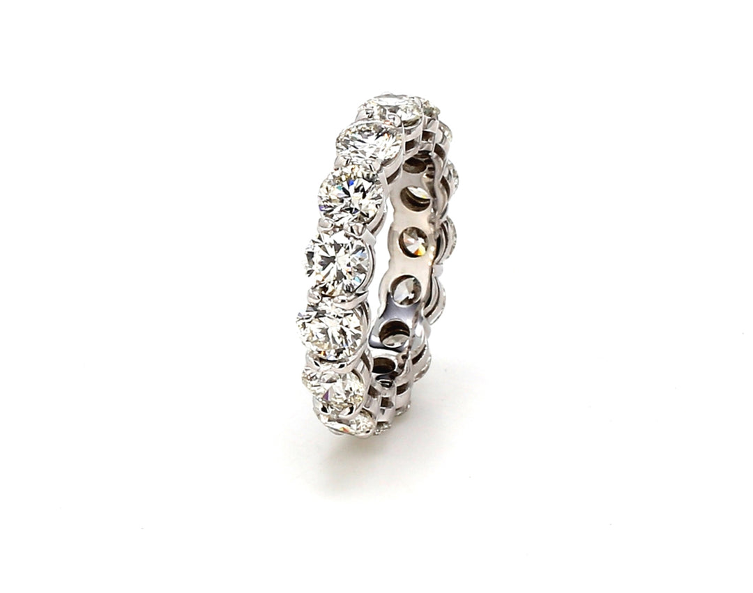 Eternity band in platinum shared prong basket set (15) round diamonds.  D4.54ct.t.w.  Size 4.75
