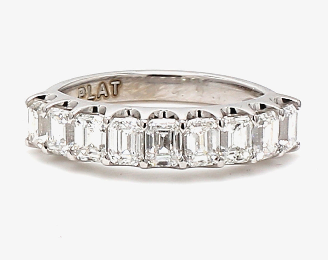 9-stone band in platinum with U-prong set emerald cut diamonds.  D1.69ct.t.w.  Size 6