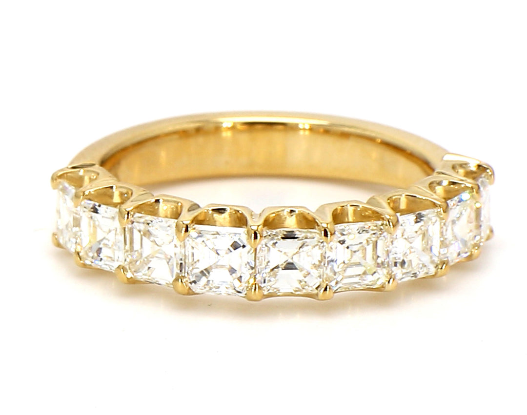 9-stone band in 18K YG with U-prong set asscher cut diamonds.  D1.98ct.t.w.  Size 7.5