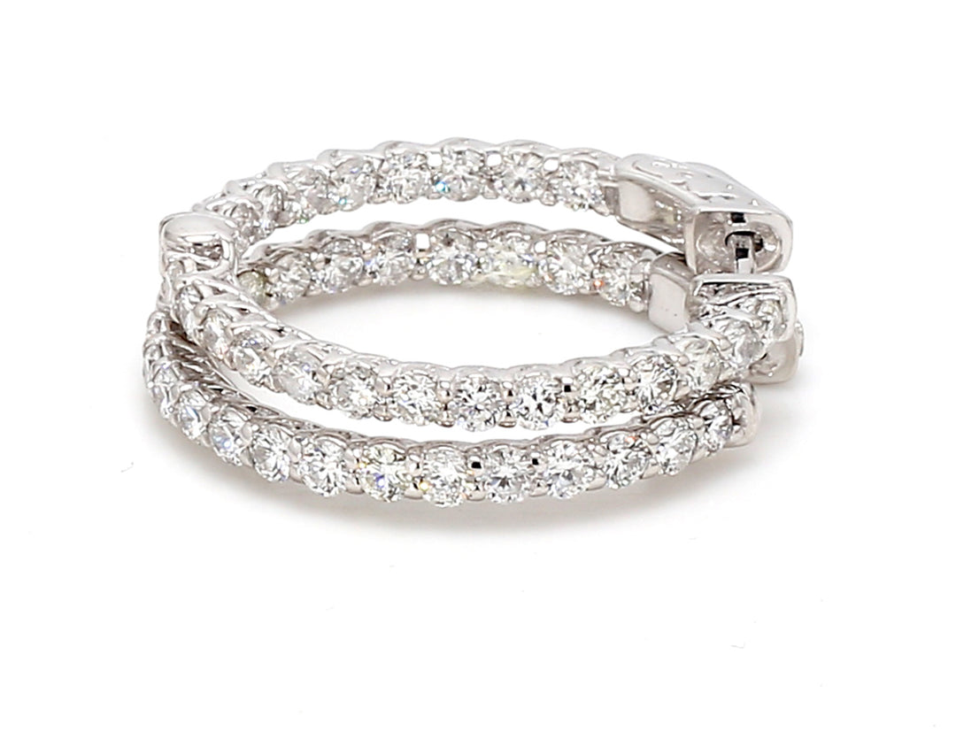 1"" Inside out hoop earrings with prong set (44) round diamonds.  D2.19ct.t.w.