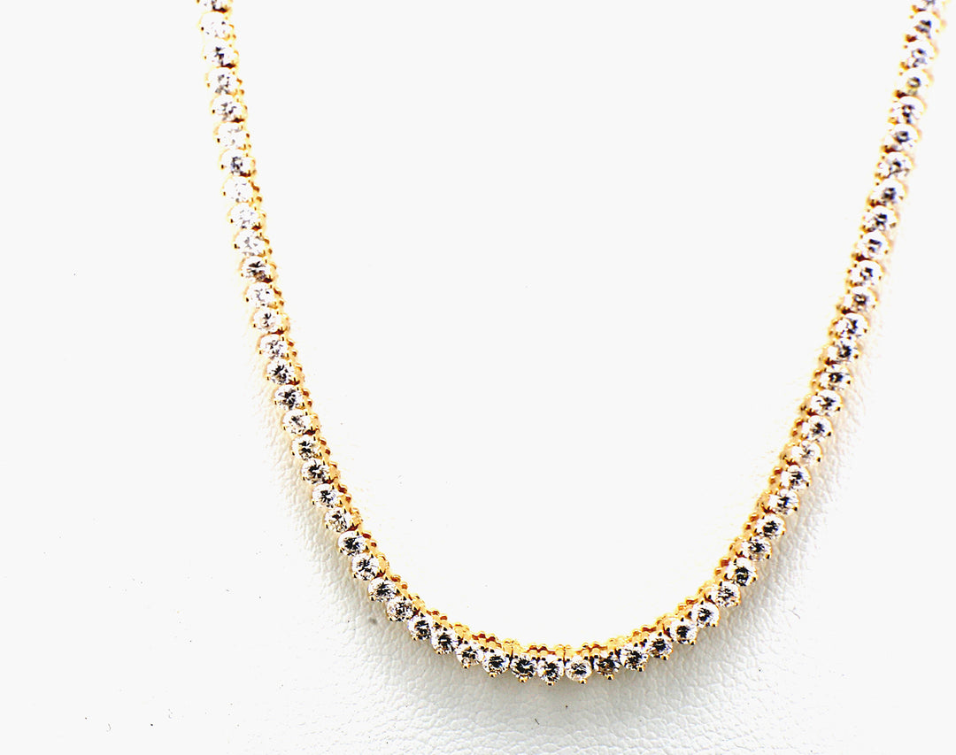 18"" Tennis necklace in 14K YG with 3-prong set round diamonds.  D5.38ct.t.w.