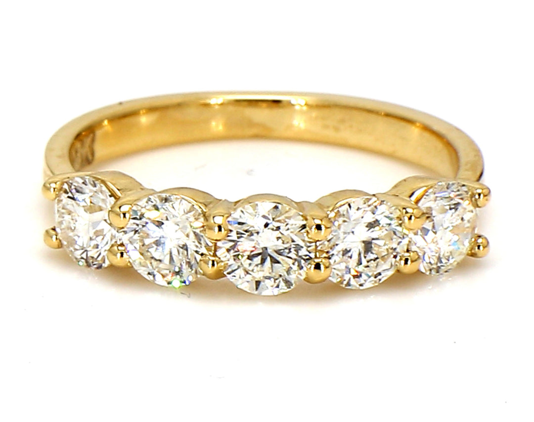 5-stone band in 18K YG with basket prong set round diamonds.  D1.32ct.t.w.  Size 6