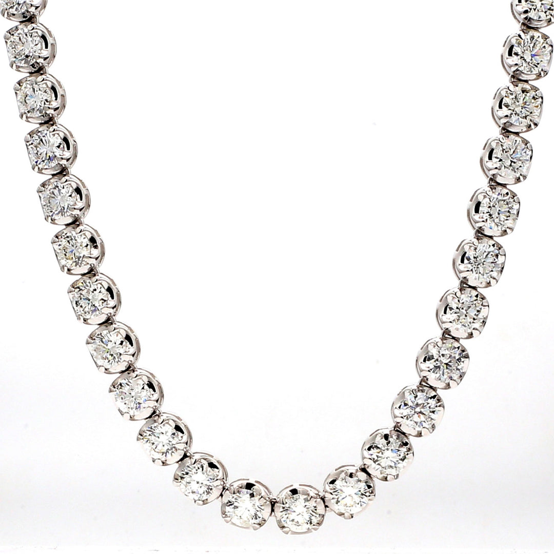 17"" Tennis necklace with illusion prong set (111) round diamonds.  D9.73ct.t.w.