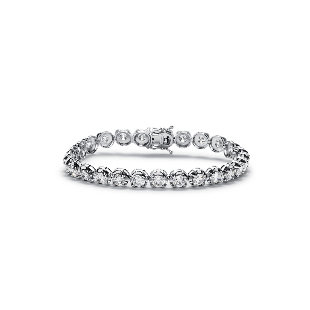 7"" Tennis bracelet in 18K WG with crown set (27) round diamonds.  D9.63ct.t.w.