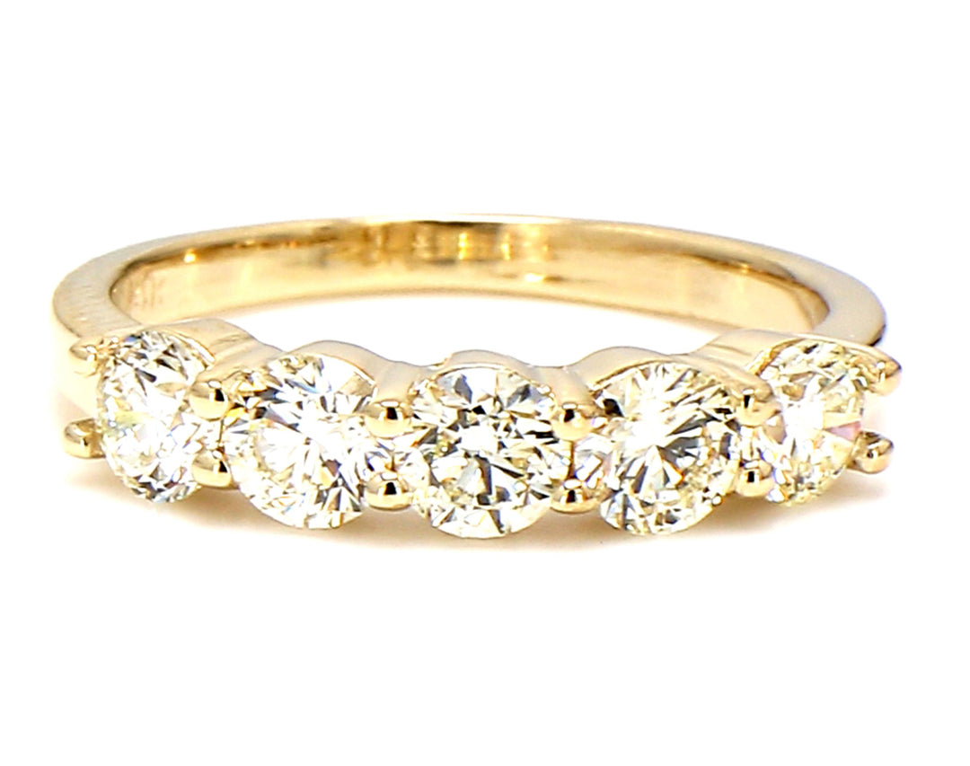 5-stone band in yellow gold with basket prong set round diamonds.  D1.26ct.t.w.  Size 6