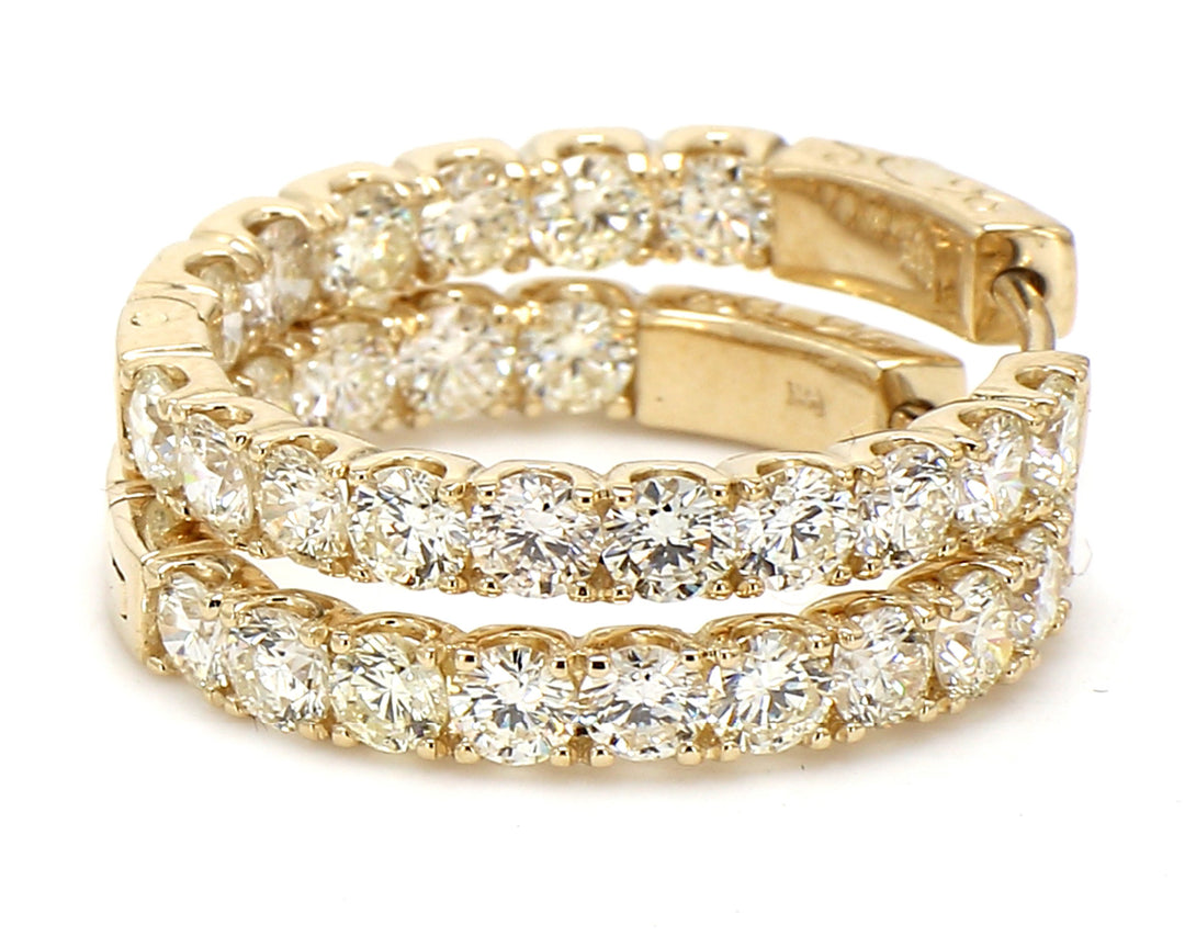 1"" Inside out hoop earrings in yellow gold with U-prong set (32) round diamonds.  D3.48ct.t.w.