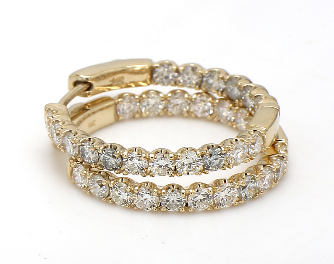 1"" Inside out hoop earrings in yellow gold with prong set (34) round diamonds.  D2.22ct.t.w.