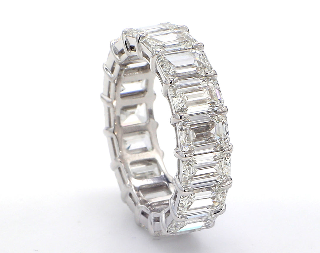 Eternity band in platinum with basket prong claw set GIA certified D-F/VVS1-VS2 (17) emerald cut diamonds.  D8.85ct.t.w.  Size 5.5