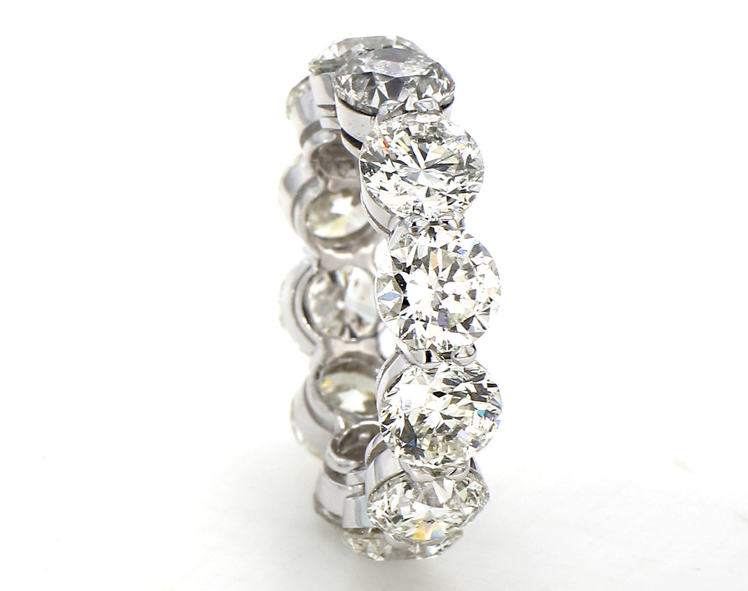Eternity band in platinum with basket prong set (12) round diamonds.  D12.02ct.t.w.  Size 7.25