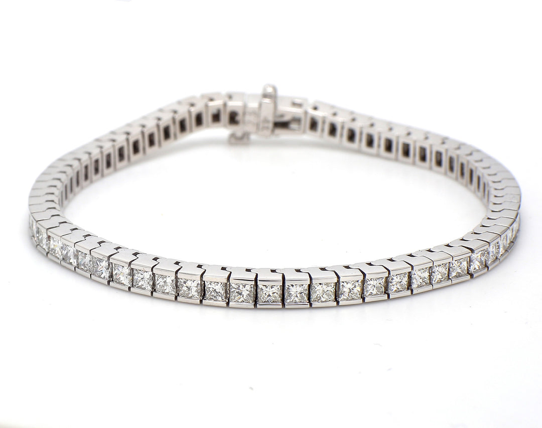 7"" Tennis bracelet with channel set princess cut diamonds.  D6.59ct.t.w.