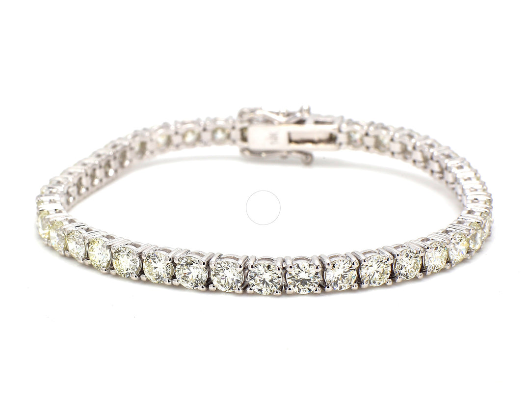 7"" Tennis bracelet with basket prong set (40) round diamonds.  D10.41ct.t.w.