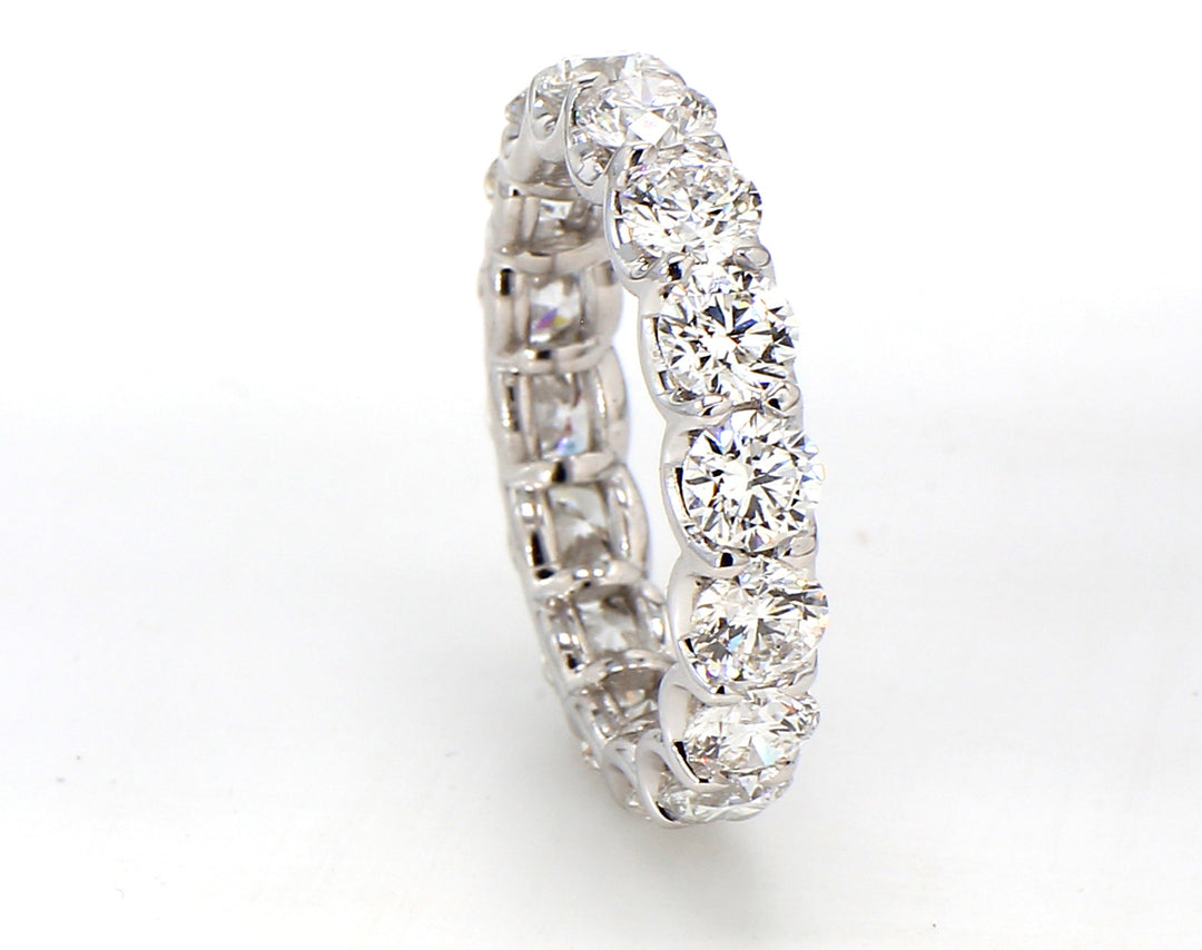 Eternity band in platinum with U-prong set (16) round diamonds.  D3.93ct.t.w.  Size 6