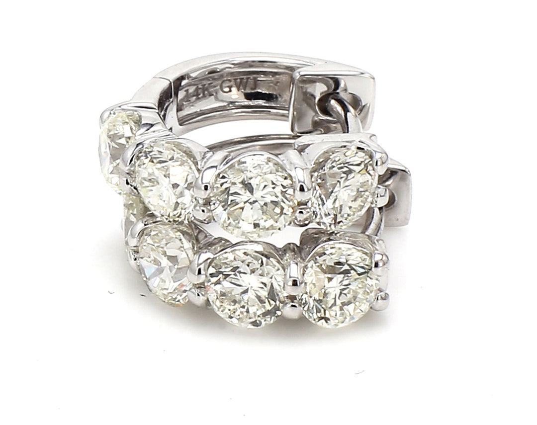 0.50"" Huggy earrings with shared prong set (8) round diamonds.  D2.34ct.t.w.