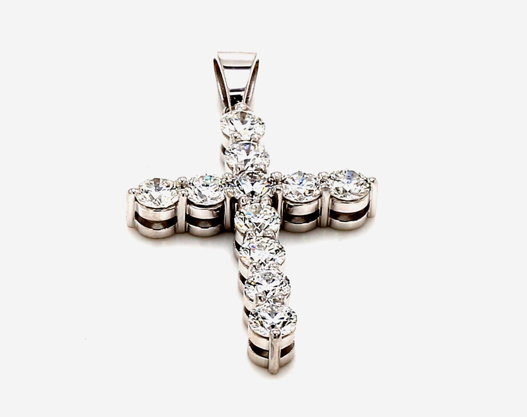 1"" Cross pendant in 18K WG with basket prong set (11) round diamonds.  D2.81ct.t.w.