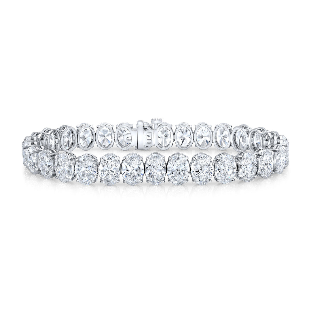 7"" Tennis bracelet in platinum with basket claw prong set GIA certified D-F/VVS2-VS2 (31) oval diamonds.  D31.17ct.t.w.