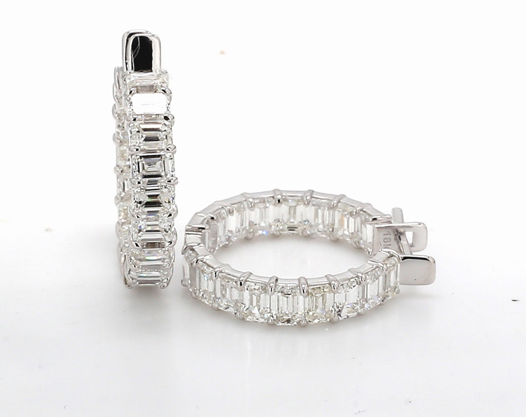 0.50"" Inside out hoop earrings in 18K WG with basket prong set (34) emerald cut diamonds.  D6.20ct.t.w.