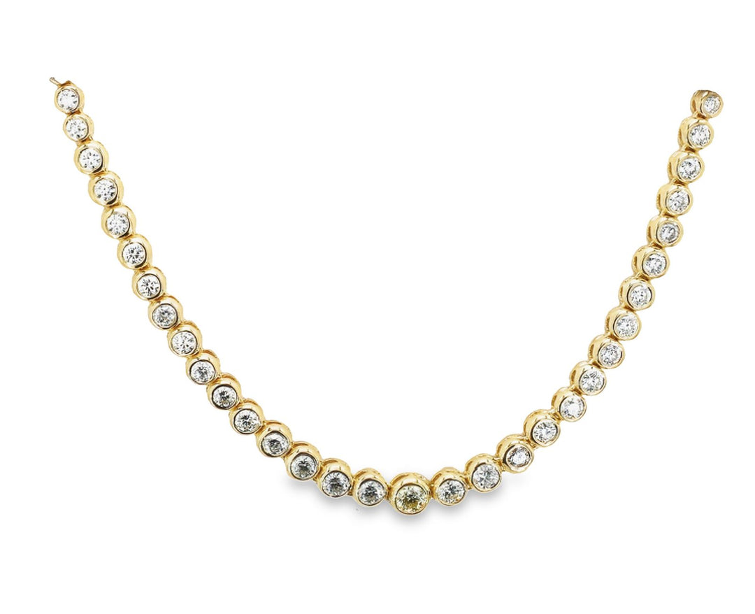 16-17.5"" Adjustable graduating tennisn ecklace in yellow gold with bezel set (87) round diamonds.  D8.48ct.t.w.