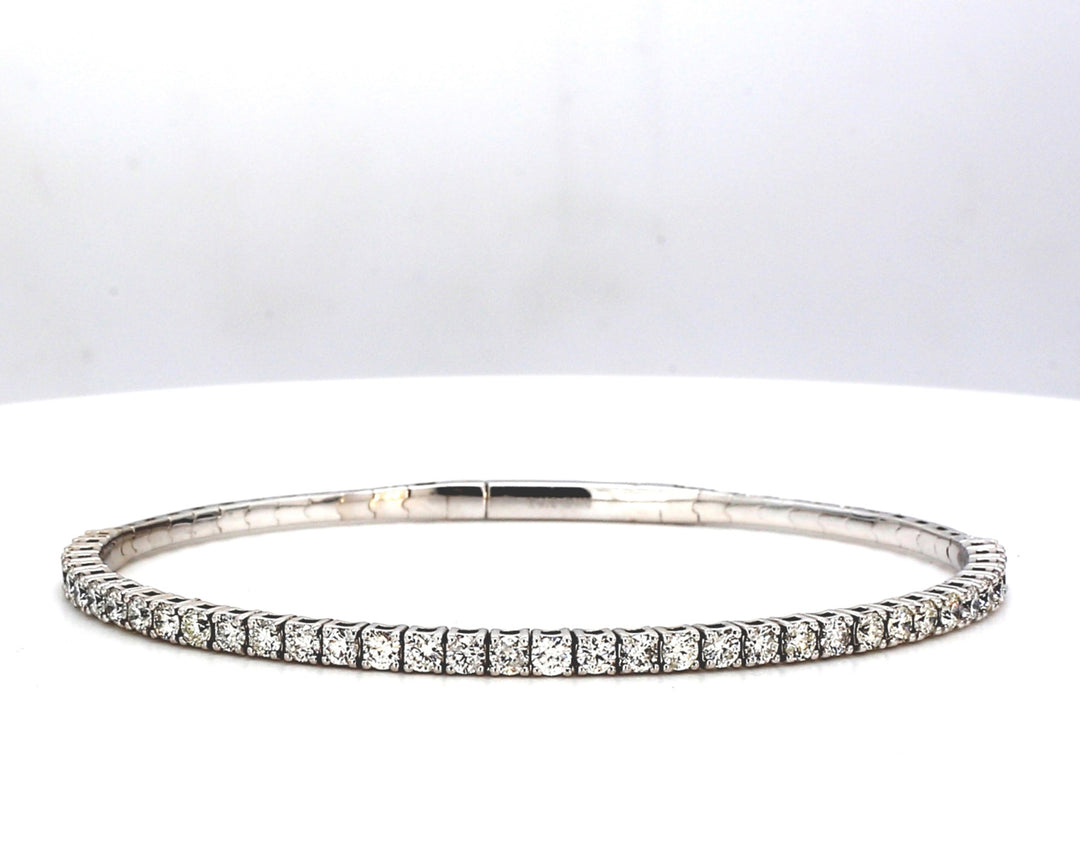 6.5"" Flex bangle with half-way shared prong set round diamonds.  D1.68ct.t.w.