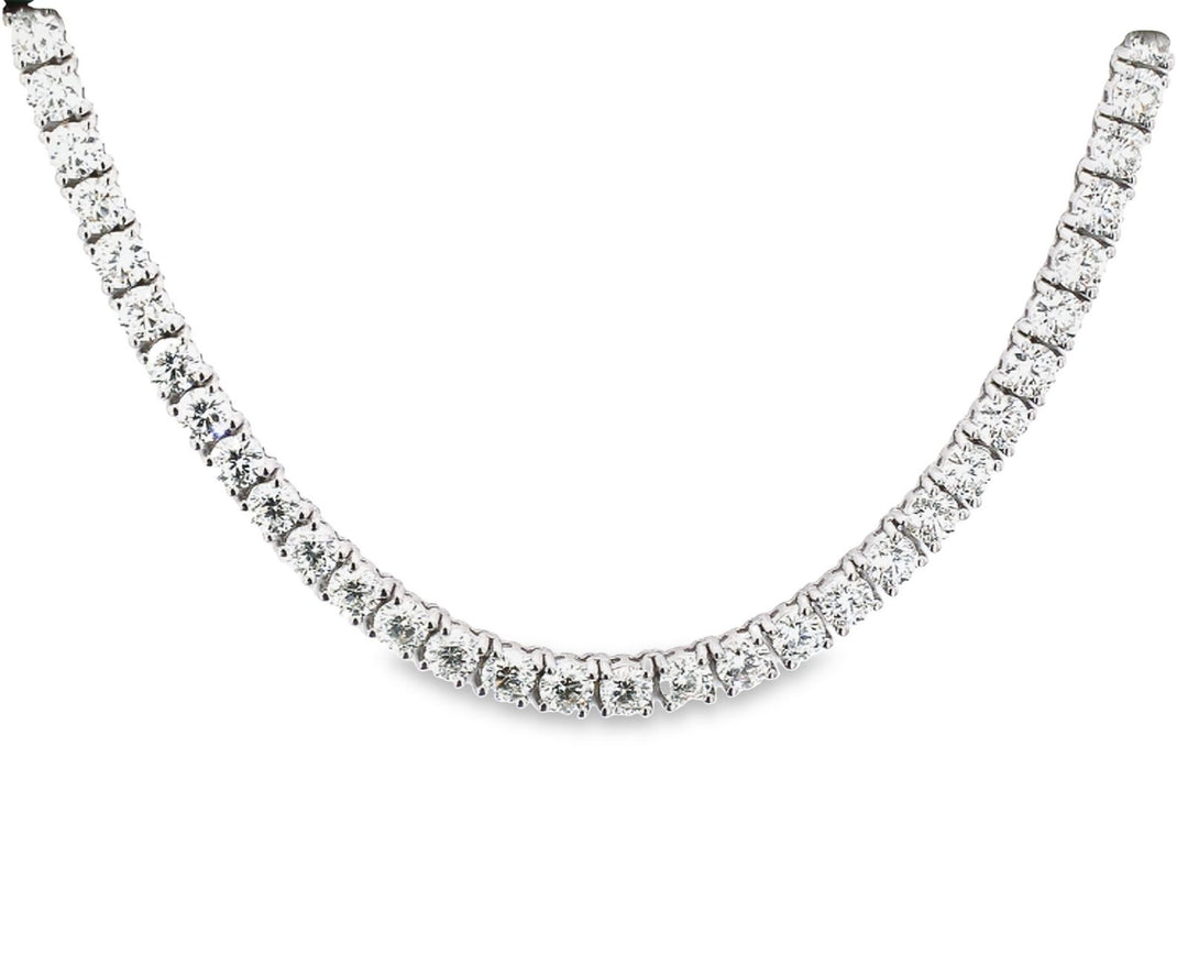 16"" Tennis necklace in 18K WG with basket prong set (84) round diamonds.  D33.40ct.t.w.