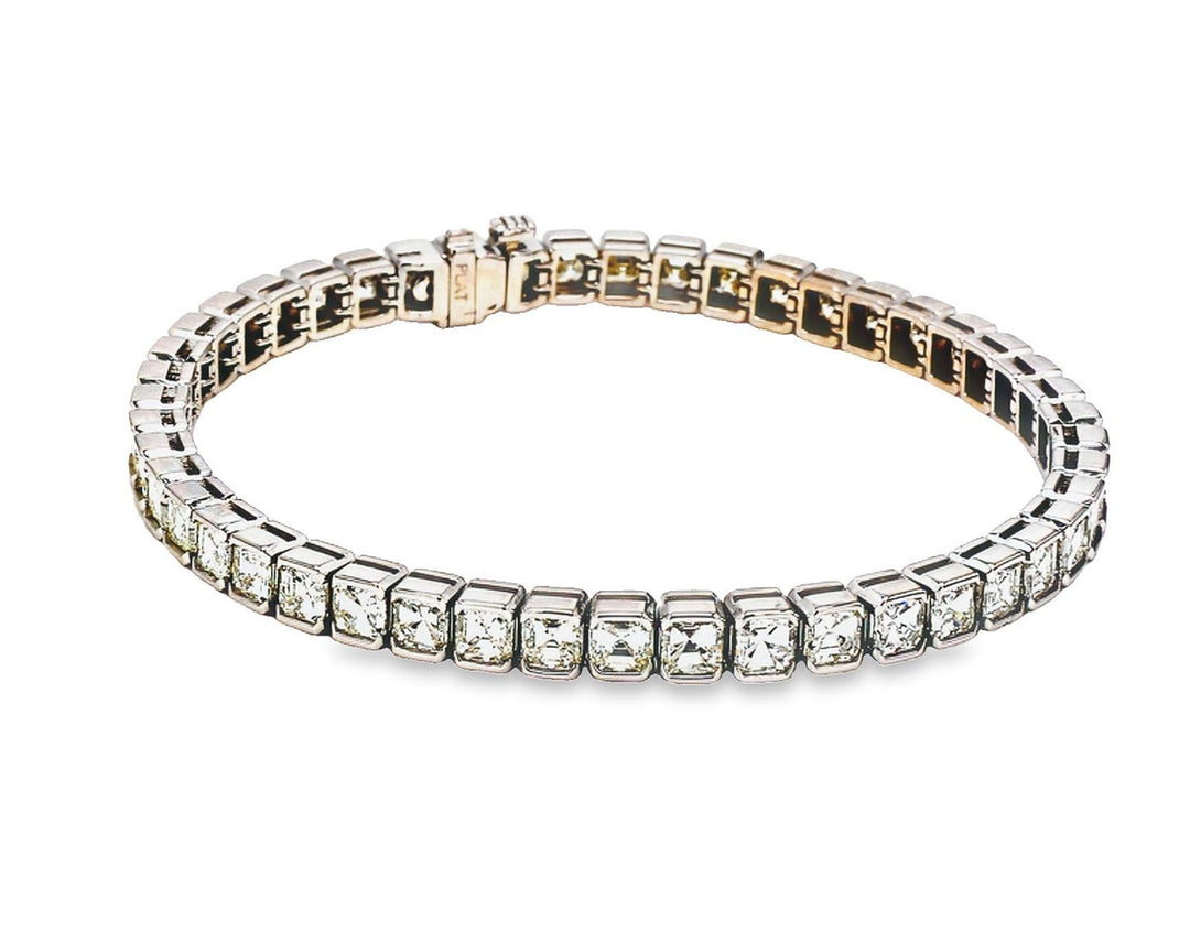 7"" Tennis bracelet in platinum with half bezel set (47) asscher cut diamonds.  D11.85ct.t.w.