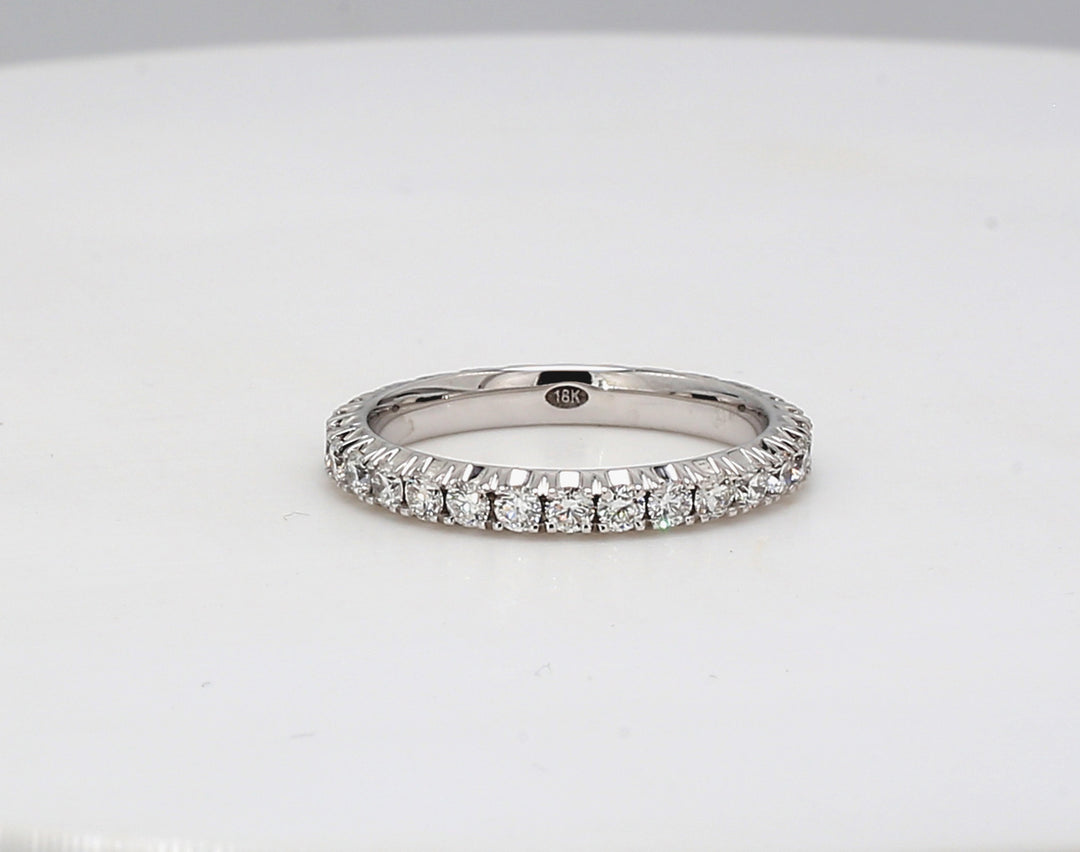 Eternity band in 18K WG with 4-prong basket set round diamonds.  D1.11ct.t.w.  Size 7