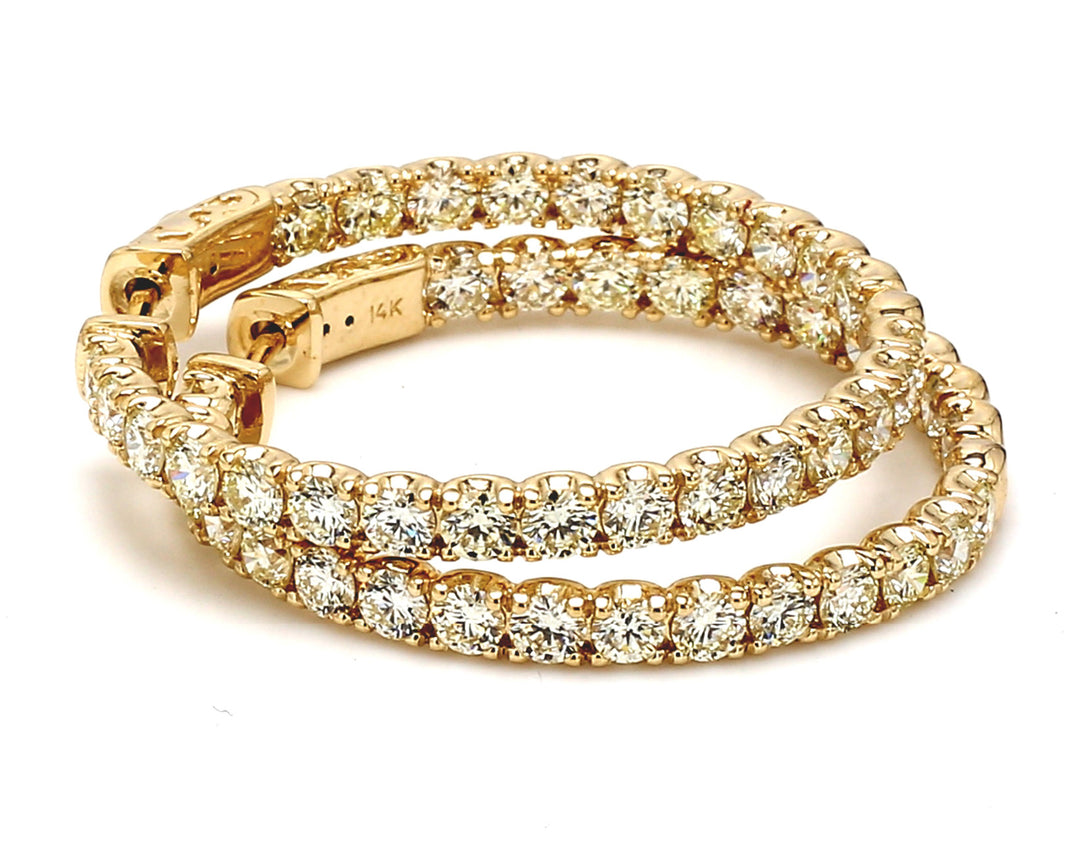 1.5"" Inside out hoop earrings in yellow gold U-prong set (52) round diamonds.  D5.60ct.t.w.