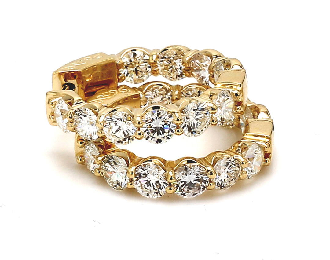 1"" Inside out hoop earrings in yellow gold with U-prong set (20) round diamonds.  D6.31ct.t.w.
