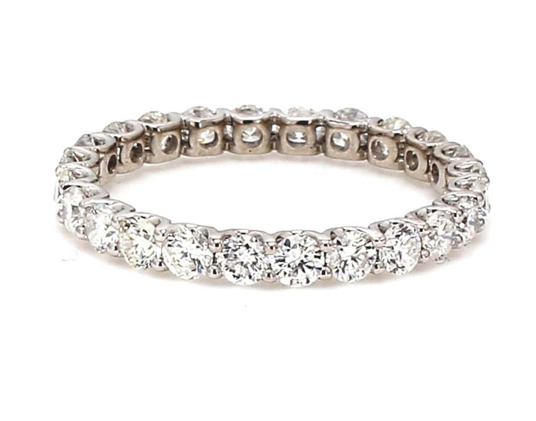 Eternity band in 18K WG with U-prong set (24) round diamonds.  D2.13ct.t.w.  Size 9