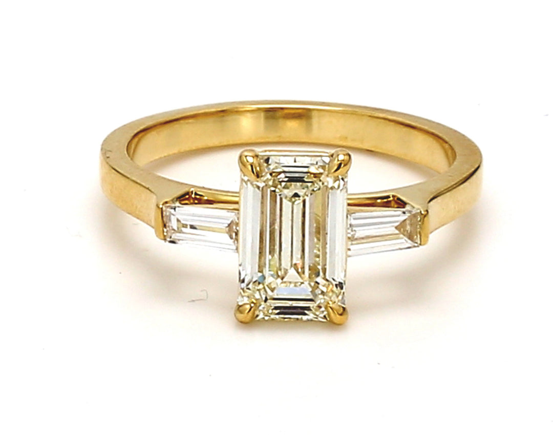 3-stone semi-mount in 18K YG with prong set baguette diamond sides.  D0.24ct.t.w.  Size 7.25
