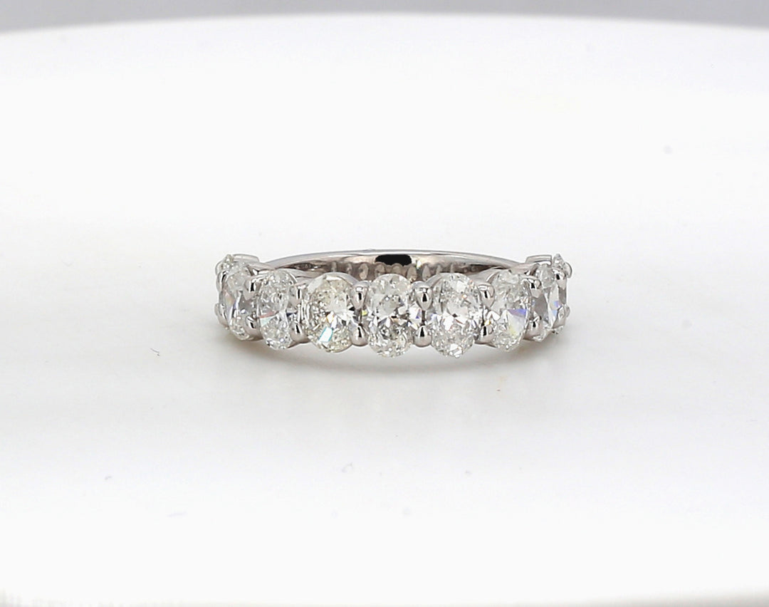 9-stone band in platinum with shared prong basket set oval diamonds.  D2.43ct.t.w.  Size 6