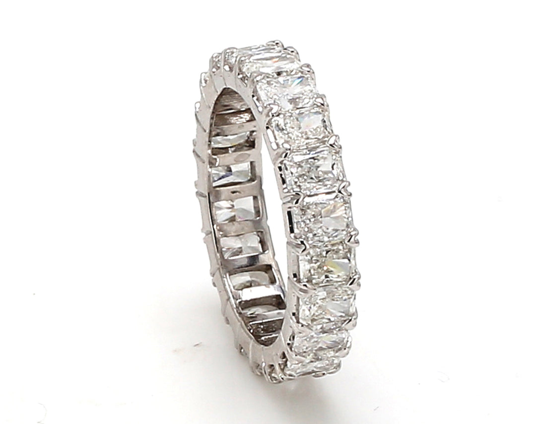 Eternity band in platinum with prong set (22) radiant cut diamonds.  D4.24ct.t.w.  Size 5.75