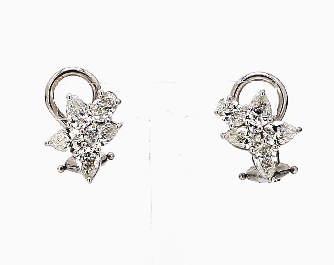 French clip cluster earrings in 18K WG with prong set (2) oval cuts and (8) pear shape diamonds.  D2.02ct.t.w.
