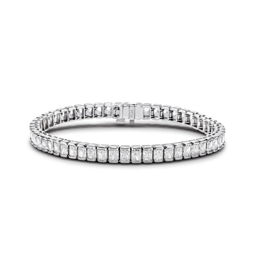 7"" Tennis bracelet in platinum with half bezel set (54) radiant cut diamonds.  D12.92ct.t.w.