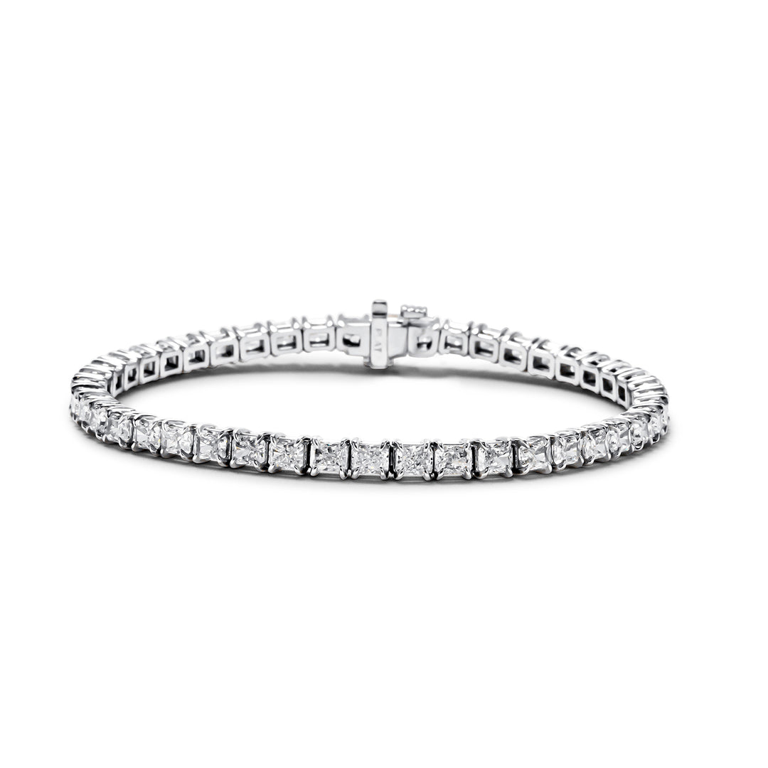 7""  Tennis bracelet east to west style in platinum with claw 4-prong basket set radiant diamonds.  D8.58ct.t.w.