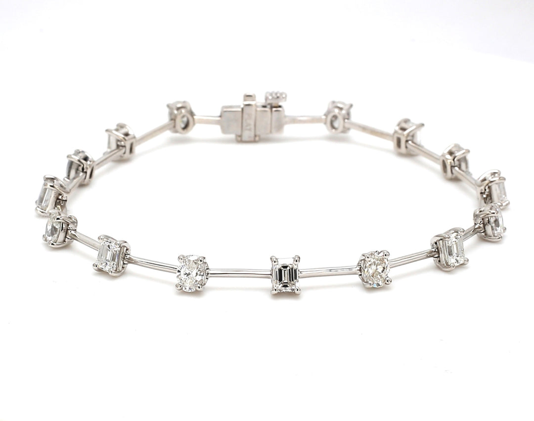 7"" Tennis bracelet in platinum w/ alternating oval & emerald cut diamonds.  D3.87ct.t.w.