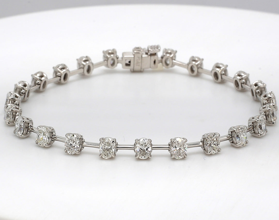 7"" Bar style tennis bracelet in platinum with prong set (24) oval diamonds.  D5.75ct.t.w.