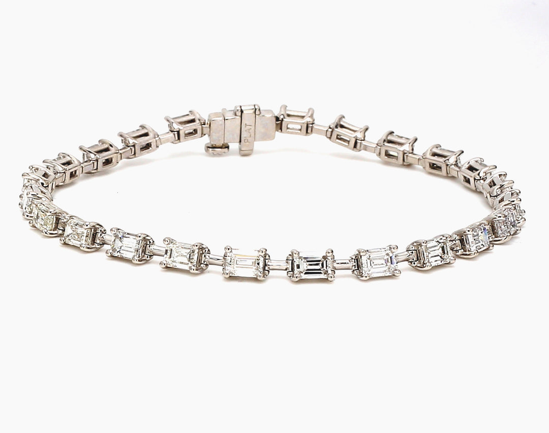 7"" Tennis bracelet in platinum with basket prong set (24) emerald cut diamonds.  D6.04ct.t.w.