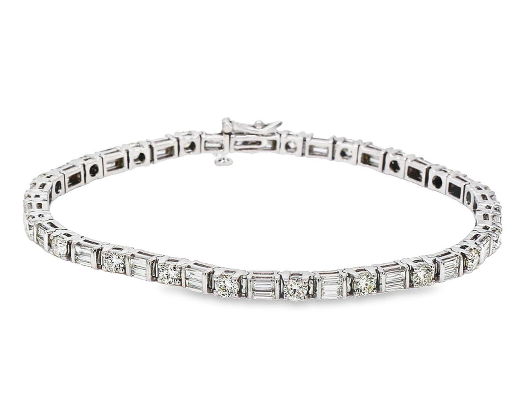 8"" Tennis bracelet with alternating basket prong set (22) rounds and (44) baguette diamonds.  D5.66ct.t.w.