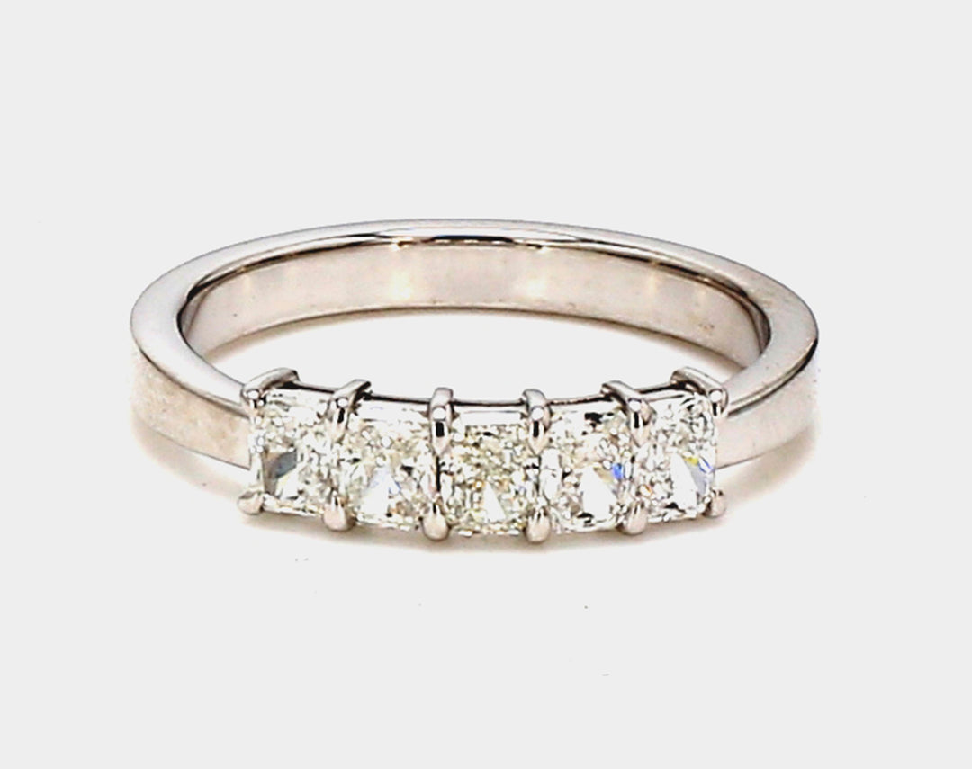 5-stone band in platinum with basket prong set radiant cut diamonds.  D0.72ct.t.w.  Size 5.5