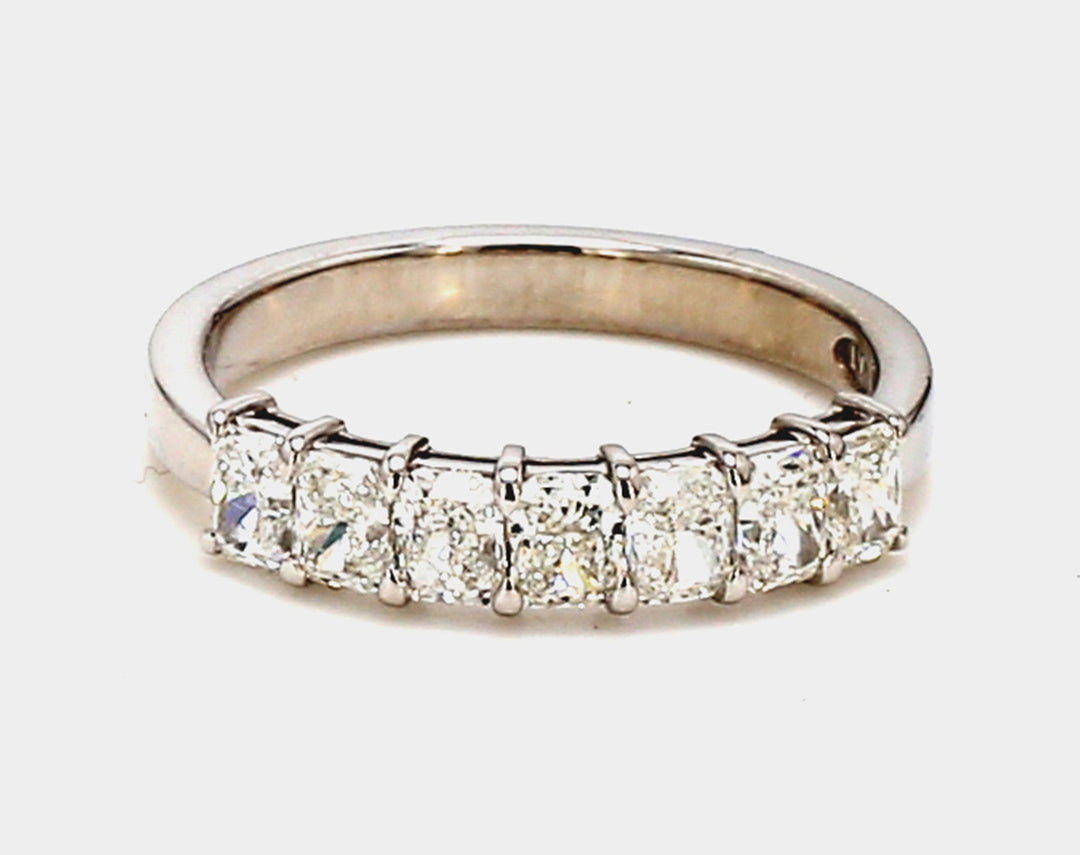 7-stone band in platinum with basket prong set radiant cut diamonds.  D1 00ct.t.w.  Size 5.5