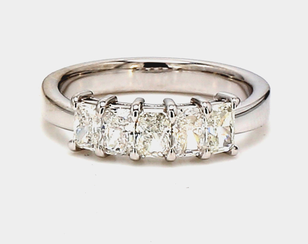 5-stone band in platinum with basket prong set radiant cut diamonds.  D1.02ct.t.w.  Size 5.75