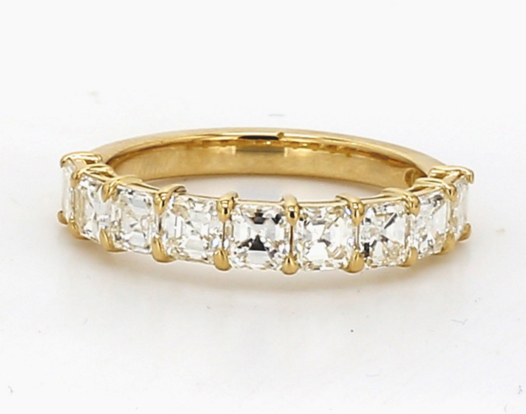 9-stone band in 18K YG with basket prong set asscher cut diamonds.  D1.48ct.t.w.  Size 5.5